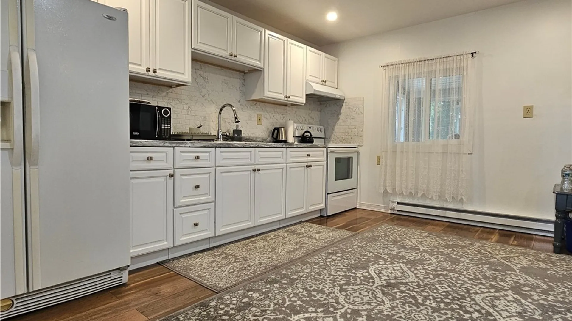 Property at 1102 Oak Street, Utica, NY 13502 11