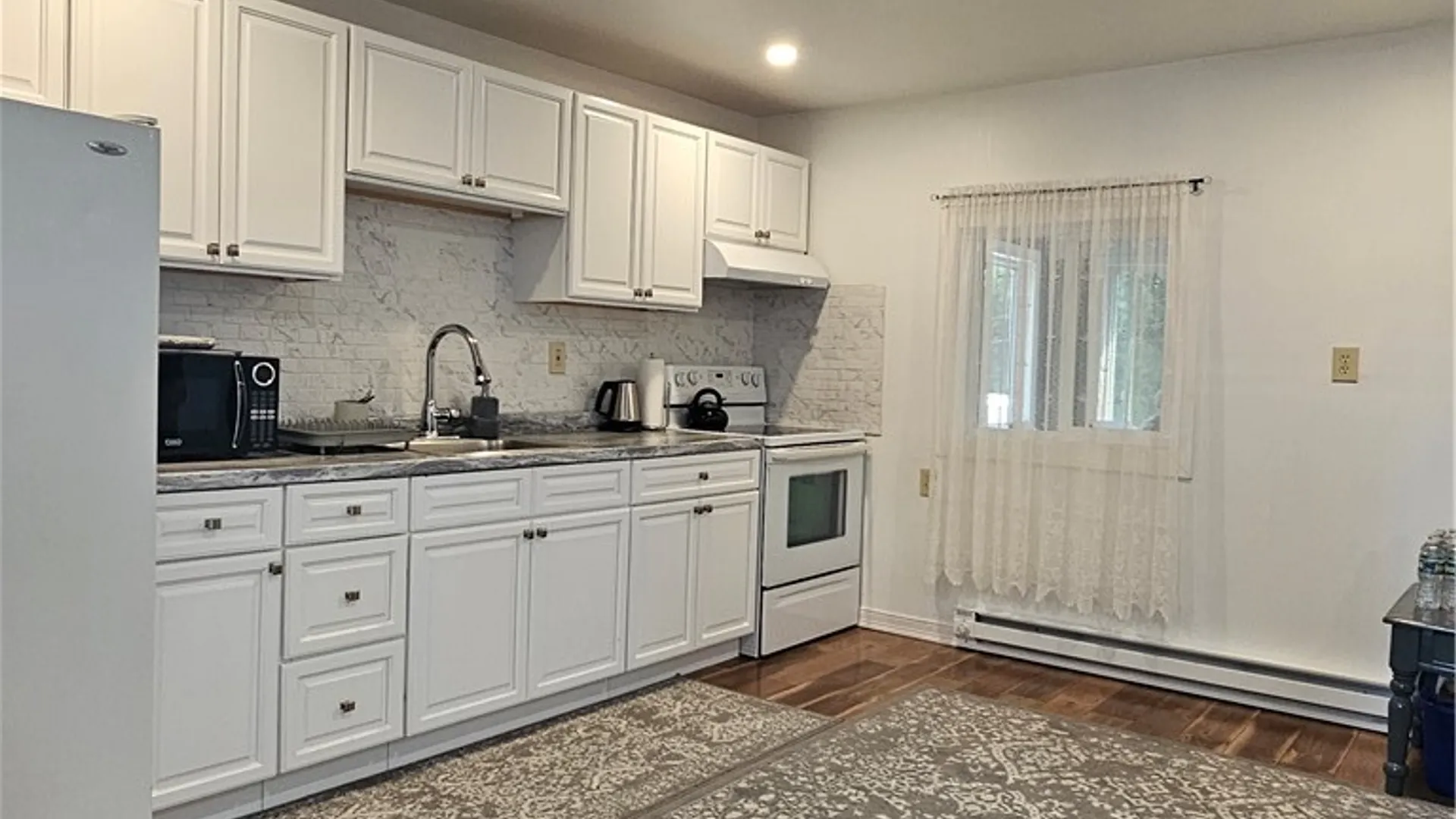 Property at 1102 Oak Street, Utica, NY 13502 9