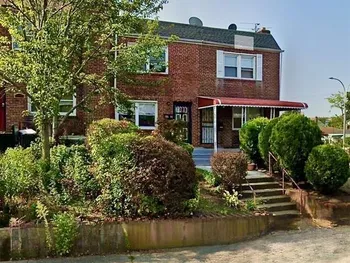 Property at 216-04 115 Terrace, Cambria Heights, NY 11411