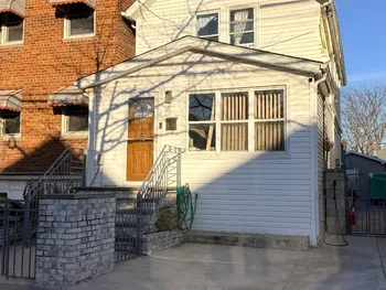 Property at 105-11 91 Street, Ozone Park, NY 11417
