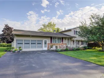 Property at 7 Flamingo Dr, Gates, NY 14624