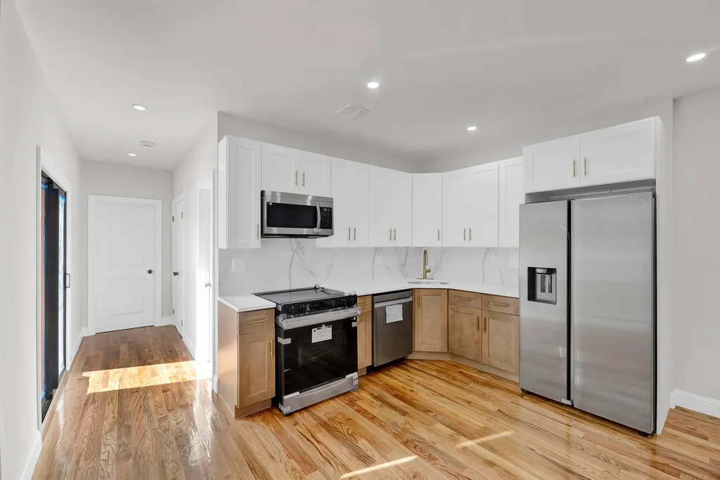 Property at 88-16 97 ave, queens, NY 11416