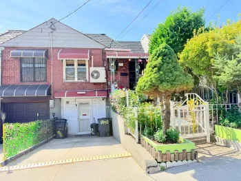 Property at 84-42 57th Ave, Elmhurst, NY 11373