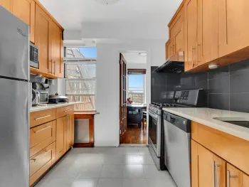 Property at 105 -34 65th Ave, Queens, NY 11375