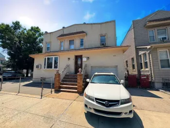 Property at 76-22 60th Lane, Glendale, NY 11385