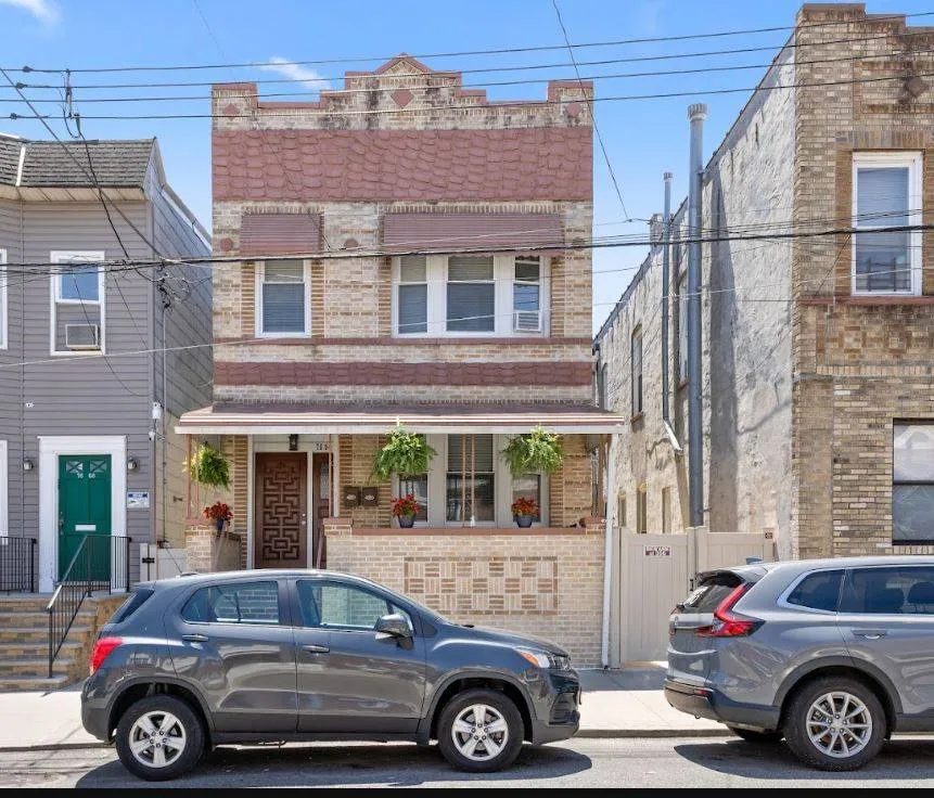 Property at 76-04 68th Ave, New York, NY, NY 11379