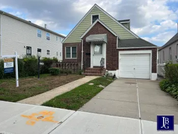 Property at 117-19 230th Street, Cambria Heights, NY 11411