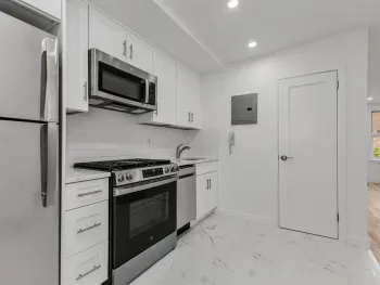 Property at 67 -14 108th St, Queens, NY 11375
