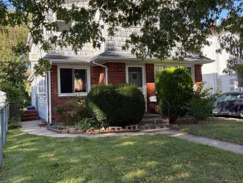 Property at 25125 Elkmont Ave, Bellerose, NY 11426