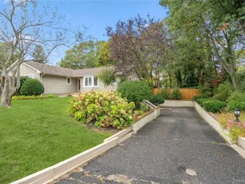Property at 77 E Woodside Avenue, Patchogue, NY 11772