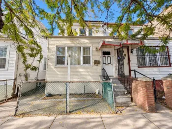 Property at 95-11 42nd Ave, Elmhurst, NY 11373