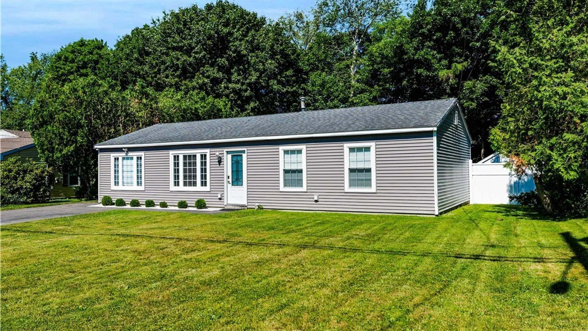Property at 411 Cedarbrook Crescent, Utica, NY 13502 3