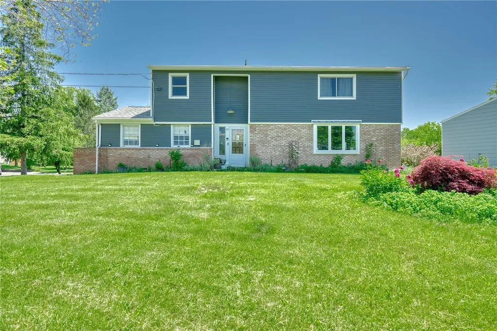 Property at 68 Green Clover Drive, Henrietta, NY 14467